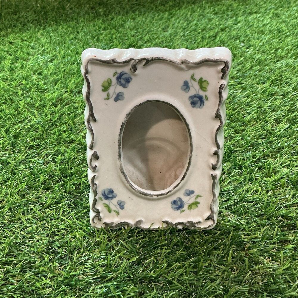 Small Porcelain Photo Frame Blue Flowers Oval Opening Silver Trim Easel Back